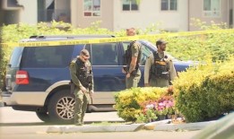 埃弗雷特汽车旅馆14小时对峙以嫌疑人投降结束;3岁的安全